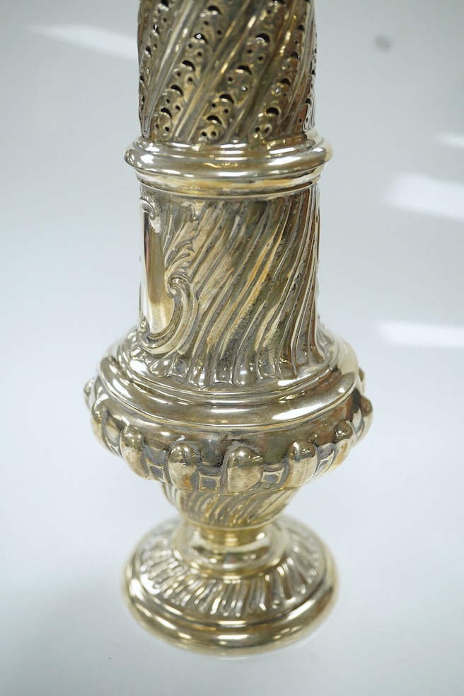 An Edwardian silver sugar caster, London, 1901, 22.6cm, together with a white metal box with hinged cover, gross weight 7.8oz. Condition - poor to fair